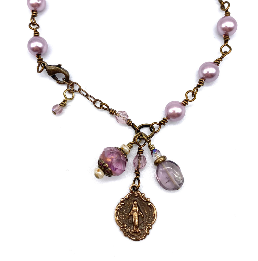 handcrafted vintage inspired lilac shell pearl wire wrapped catholic heirloom miraculous medal devotional bracelet