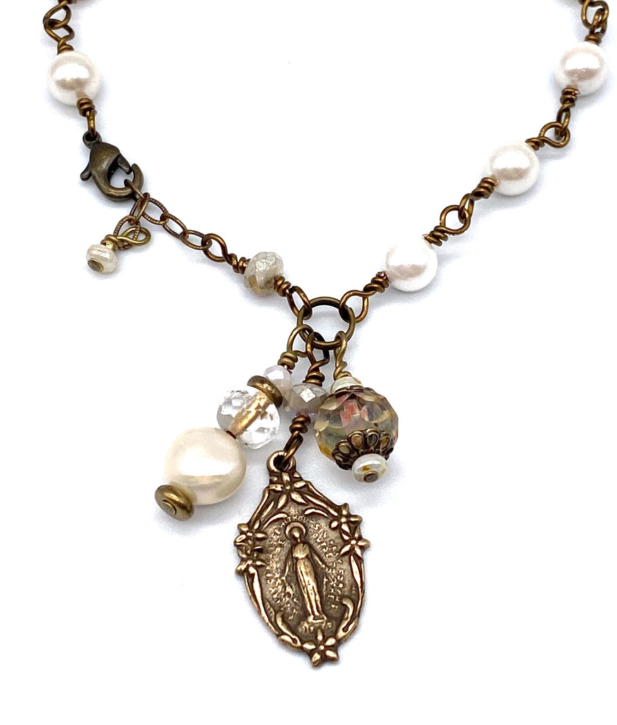 handcrafted vintage inspired white shell pearl wire wrapped catholic heirloom miraculous medal devotional bracelet